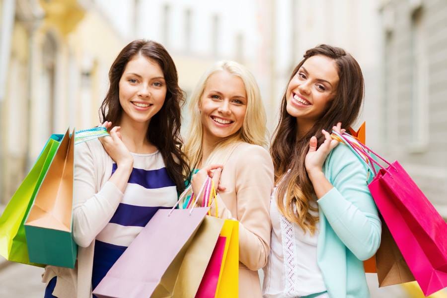 Group of girls with shopping bags