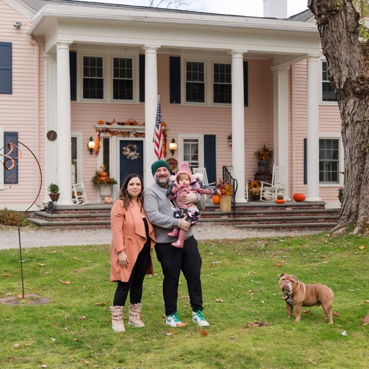 happy family in front of The Inn at Stockbridge