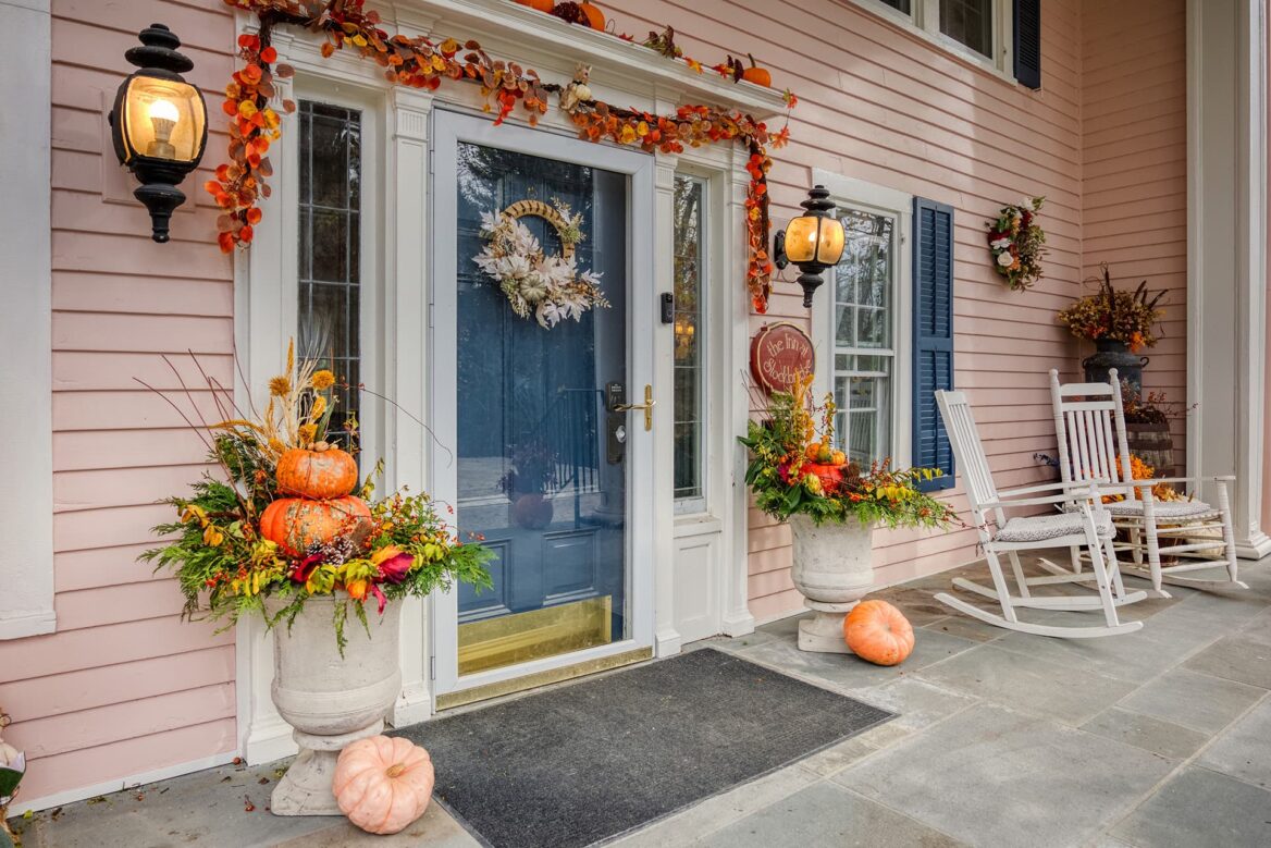 front porch decorated for fall