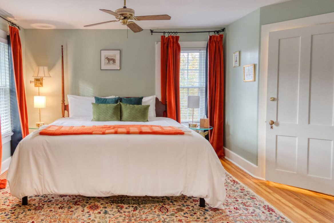 bright and colorful king-size guest bedroom